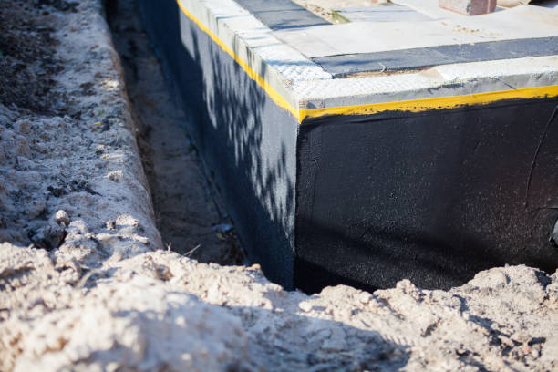 Professional Emergency Waterproofing technician working in Morton Grove, IL